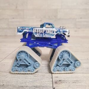 HOT WHEELS Blue White Twisted Tredz Bigfoot Monster Jam Monster Truck Die-Cast